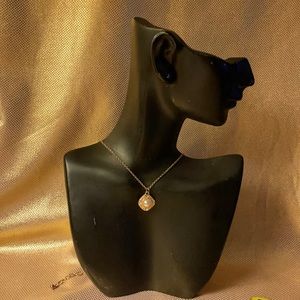 Gold colored necklace with pearl look pendant. 18” with extender chain
